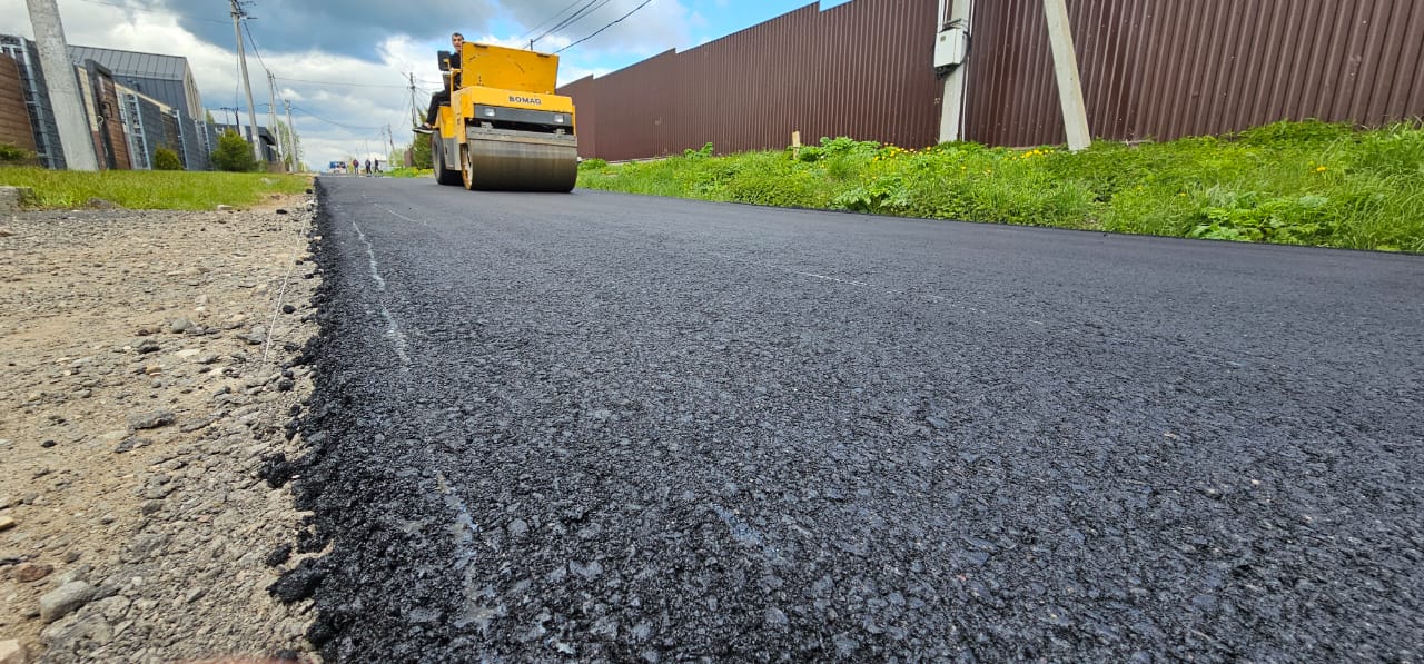 Ремонт асфальта. ﻿Вознесенск, Курганная улица, 12